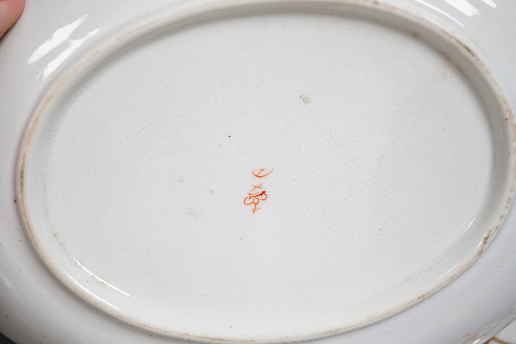 A small Derby tureen cover and stand, c.1825, 22 cm wide, and an English porcelain floral ice pail and cover (lacking liner)